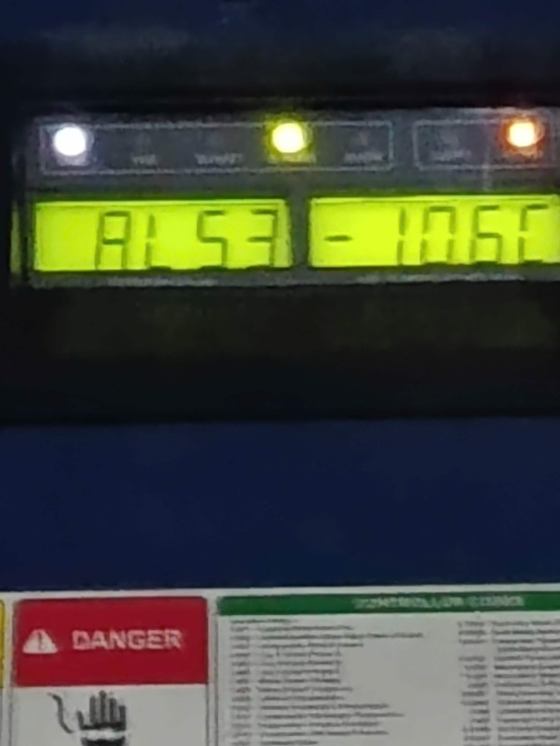 Reefer container controller display showing alarm code AL53 and a temperature reading